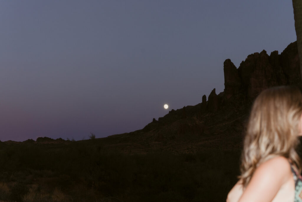 A copywriter looks out into the desert landscape while pondering her career.